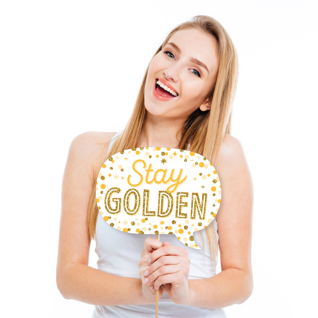 Golden Birthday selfie photo booth props with dowels and stickers
