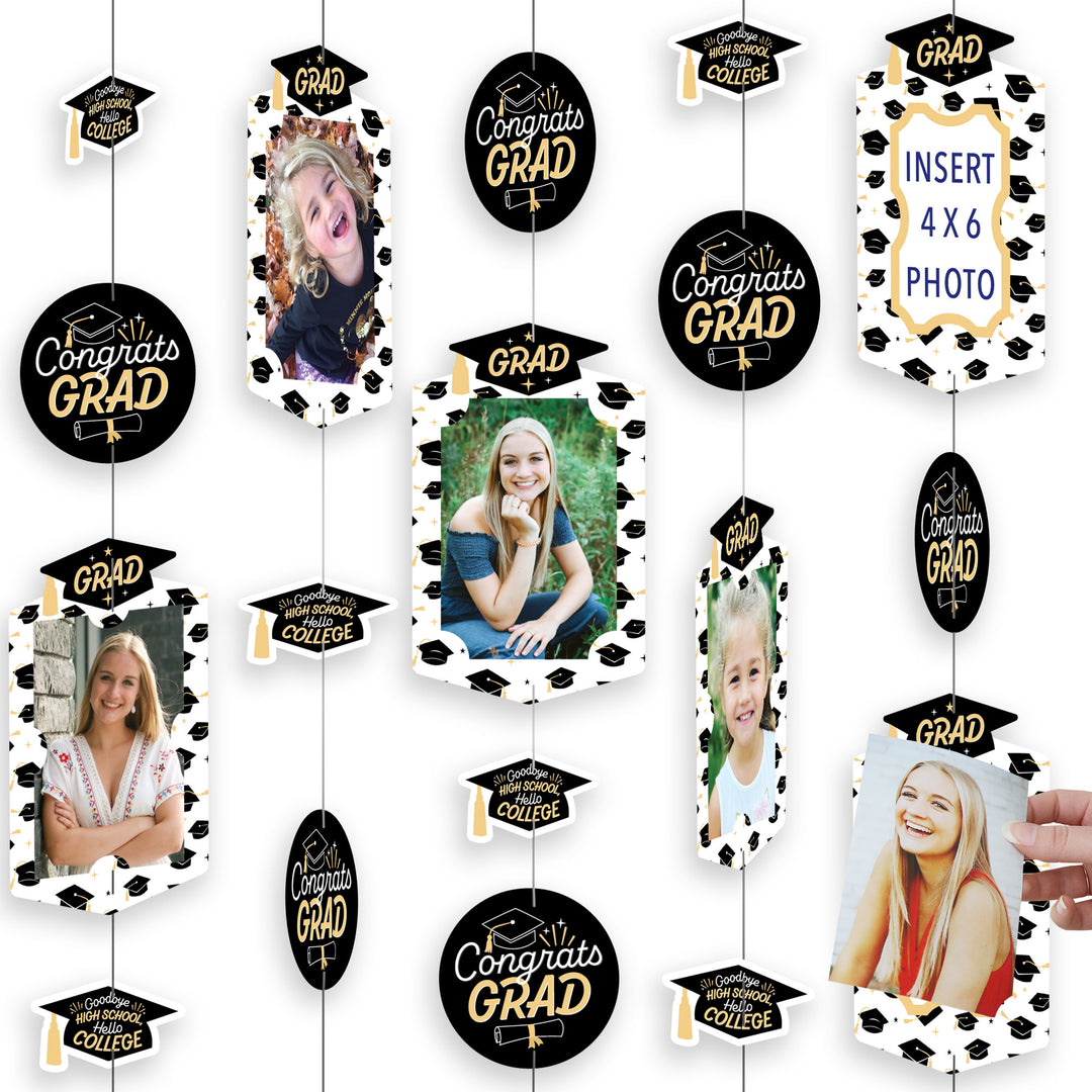 A graduation party photo display decoration kit featuring hanging vertical photo garland with cut-out shapes, including frames, circles, and caps, arranged with photos and text that reads 'Congrats GRAD'.