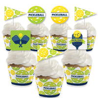 A set of cupcake decoration kit with pickleball-themed patterns, including wrappers and treat picks.