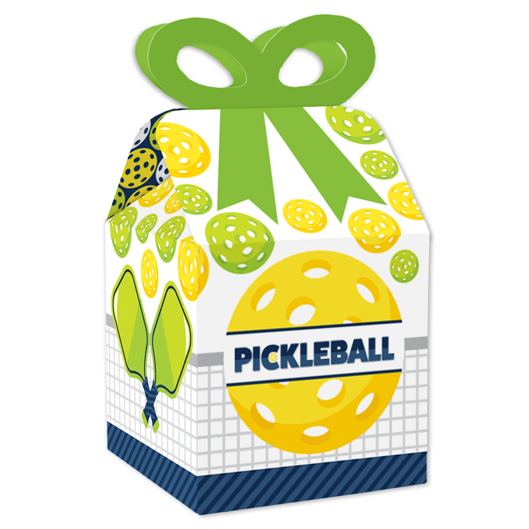A square favor gift box with a pickleball theme, featuring yellow and green colors and designs, including a pickleball paddle and balls.