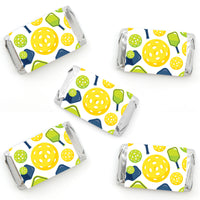 Mini candy bar wrappers with a pickleball pattern, including yellow, blue, and green colors.