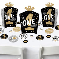 A set of birthday party decorations featuring black and gold colored elements with text reading 'Mr. Onederful'.