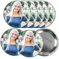 A set of 8 custom pinback buttons with a photo to them, displaying an image of a smiling person wearing a blue off-the-shoulder top.
