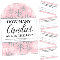 A set of pink and white snowflake-themed cards for a 'How Many Candies Are In The Jar?' game, including a stand sign and 40 guessing cards.