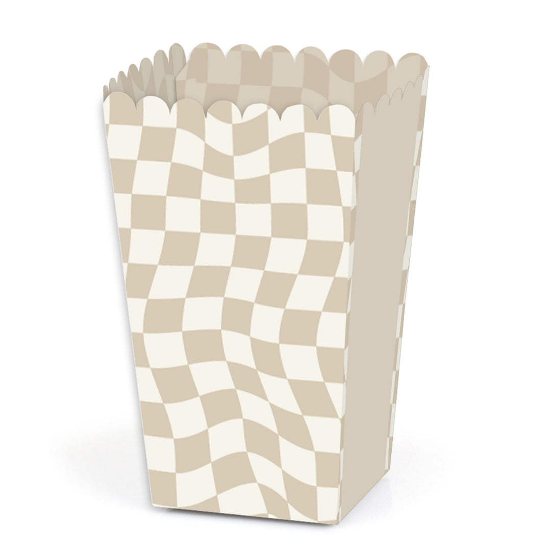 A tan checkered party favor popcorn treat box.