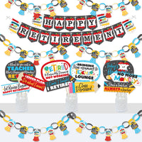 A set of decorations for a teacher's retirement party, including a bunting banner, paper chains with tassels, and various photo booth props arranged on a white background.