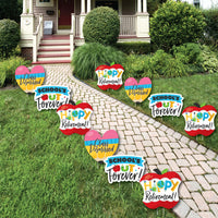 A set of colorful Teacher Retirement lawn decorations displayed on a garden path, featuring shapes like pencils, apples, and hearts, with text such as 'School's Out Forever', 'ClassDismissed', and 'Happy Retirement'.