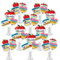 A collection of colorful, apple-shaped, and text-based table toppers related to teacher retirement celebrations.