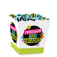 A set of Through the Decades party mini favor boxes with 50s, 60s, 70s, 80s, and 90s theme decorations, designed for holding candy treats.