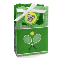 A green favor box with a 'Game On!' tennis-themed design, featuring a white ribbon, a tennis ball, and rackets.