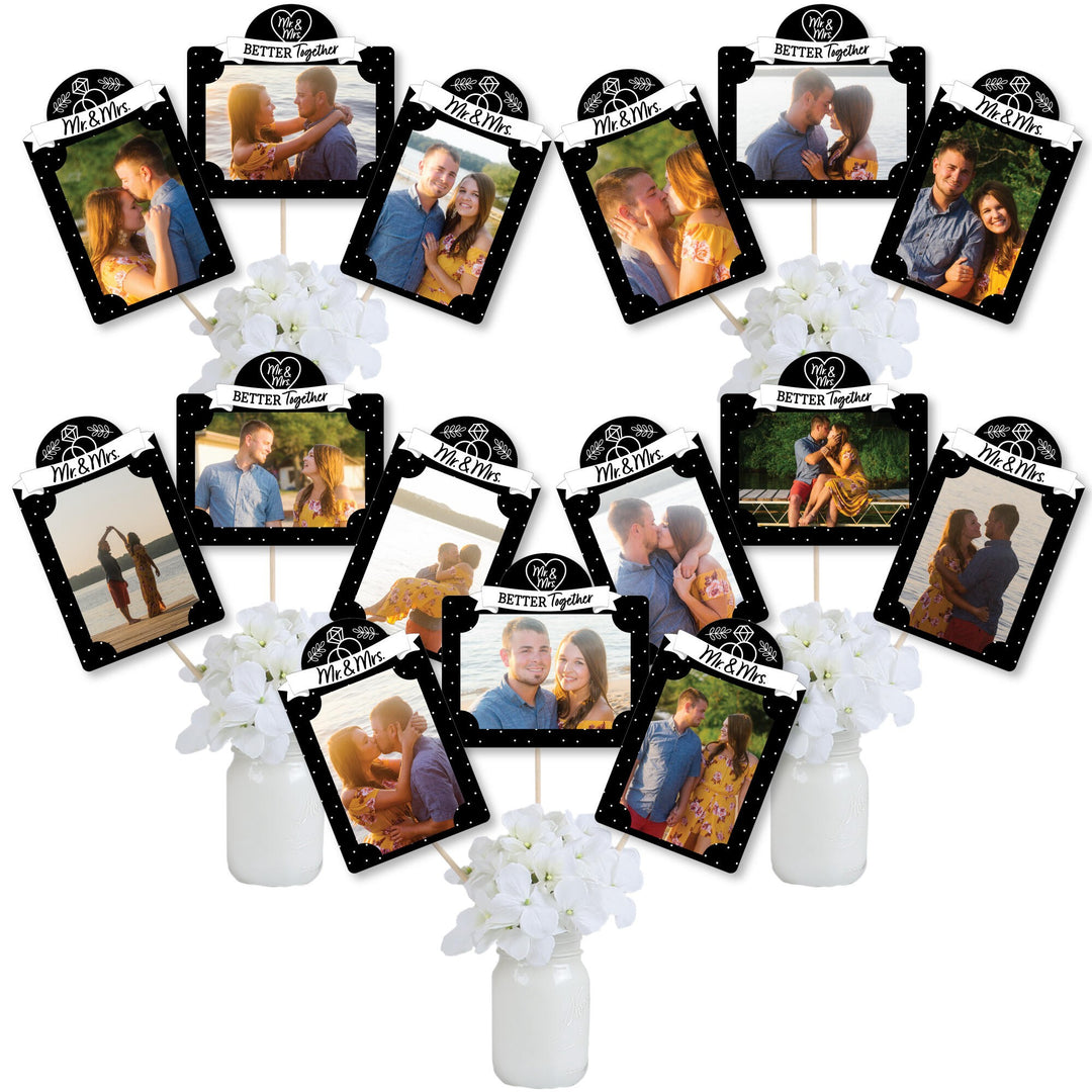 A collection of 'Mr. and Mrs. table centerpiece decorations in a classic black design