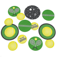 A set of circular confetti with tennis ball, racket, and serves-themed decorations in green, yellow, black, and white colors.
