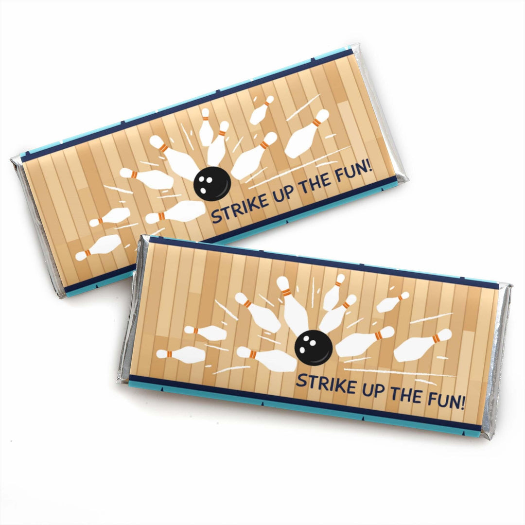 Candy bar wrappers with a bowling theme, featuring bowling balls and pins, and the text 'STRIKE UP THE FUN!'