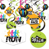 A set of colorful party decoration swirls with running-themed motifs, including text and silhouettes of runners, in an accordion-style spiral.