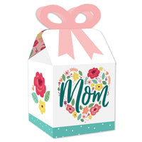 A square favor gift box with a colorful floral design and the word 'Mom' in the center, adorned with a pink ribbon on top.