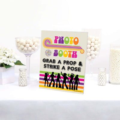 70's Disco Photo Booth Sign - 1970s Disco Fever Party Decorations - Printed on Sturdy Plastic Material - 10.5 x 13.75 inches - Sign with Stand - 1 Piece