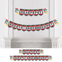 A bunting banner with the words 'HAPPY RETIREMENT' and themed pennants displayed across a decorative fireplace.