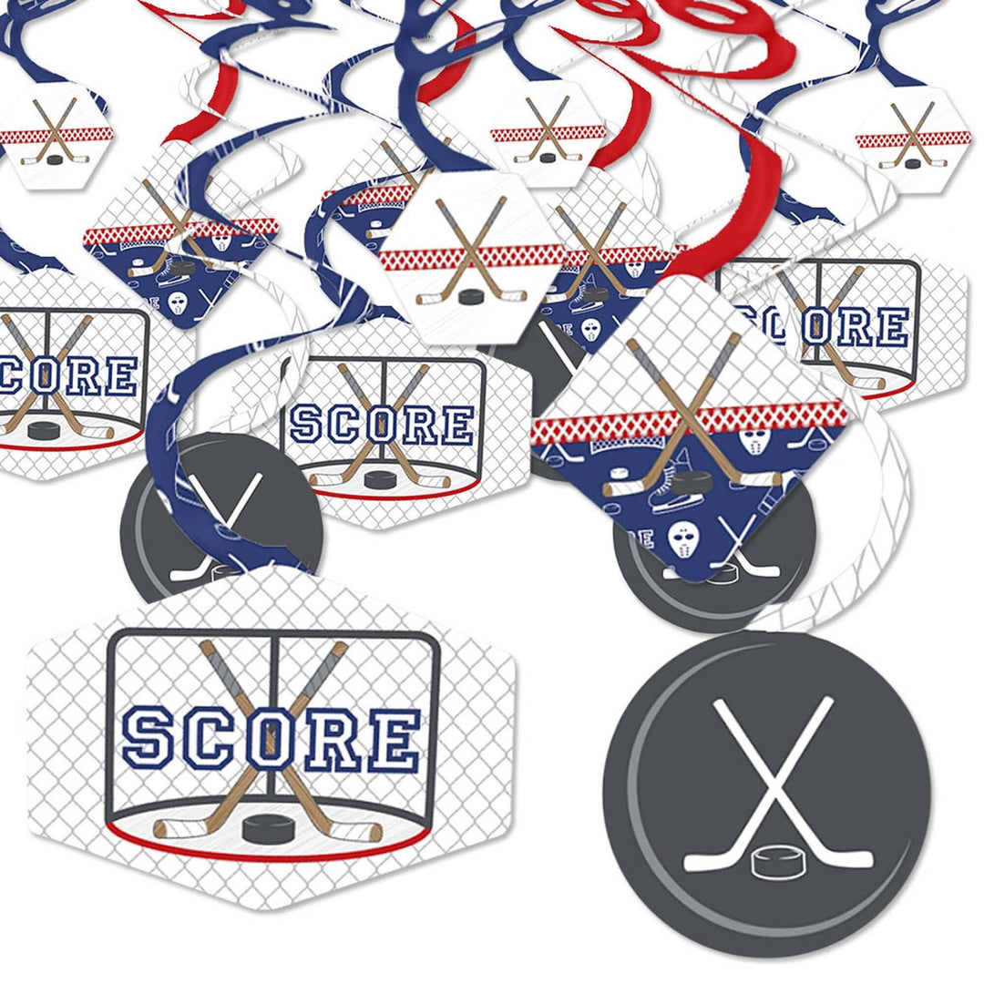 A set of hockey-themed party decoration swirls with phrases like 'SCORE' and hockey stick and puck designs in red, white, and blue colors.