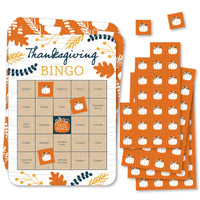 A set of rectangular bingo cards with Thanksgiving-themed decorations and markers with pumpkins on them.