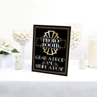 Roaring 20's Photo Booth Sign - 1920s Art Deco Jazz Party Decorations - Printed on Sturdy Plastic Material - 10.5 x 13.75 inches - Sign with Stand - 1 Piece