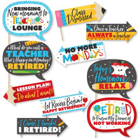 A collection of colorful printed photo booth props with various humorous teacher retirement-themed phrases.