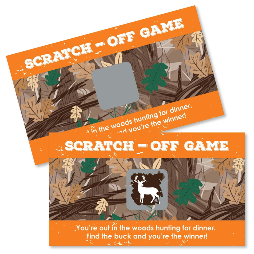 Two scratch-off game cards with camouflage pattern and deer imagery, one with the scratch-off panel covered and another revealing the game underneath.