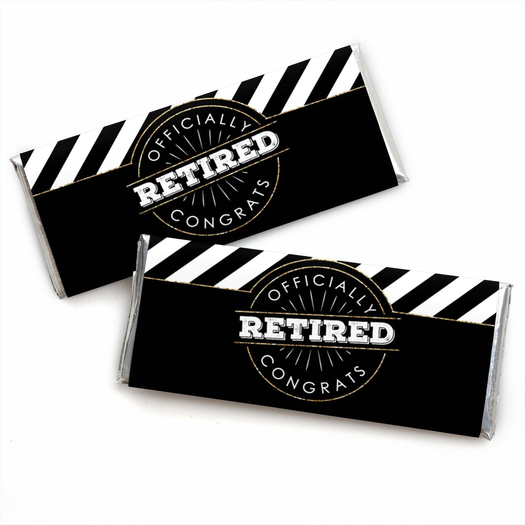 Two candy bar wrappers with a black and white striped design and the word 'RETIRED' prominently displayed in the center.