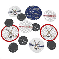 A set of round paper confetti pieces for hockey-themed parties, with designs including hockey sticks, pucks, and checkered patterns in red, white, and blue colors.