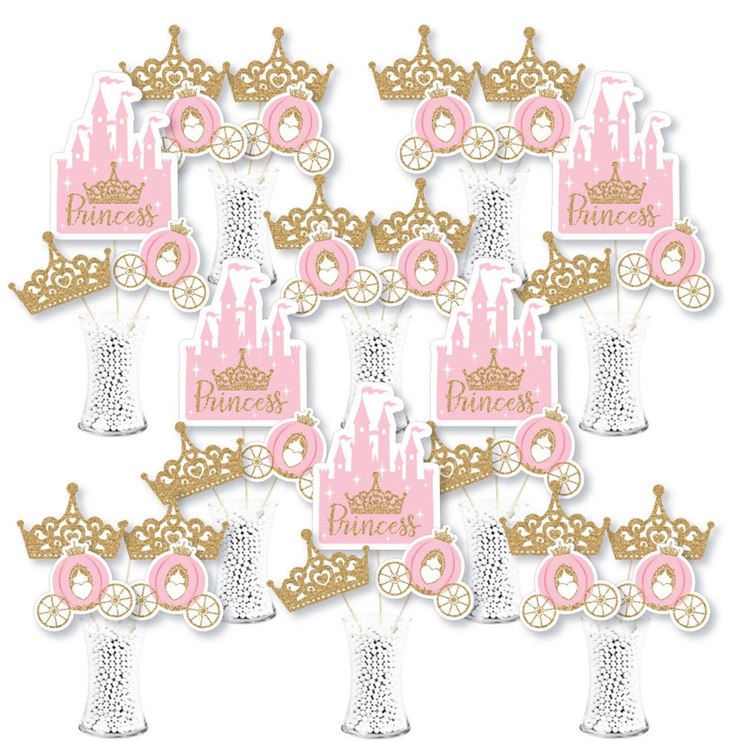 A set of pink and gold colored table toppers with princess crown designs, intended for party decorations.