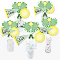 A set of party centerpiece sticks with tennis theme including shapes of tennis rackets, tennis balls, and flags with the phrase 'YOU GOT SERVED'.