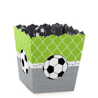 A set of soccer-themed mini favor boxes with a green and gray color scheme, featuring soccer balls and net patterns.