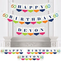 A personalized birthday banner with 'Happy Birthday' text and colorful pennants in various shapes and colors, with the name 'Devin' printed on it.
